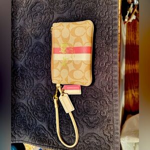 Coach Brand Tan Wristlet with Pink Stripe and Logo